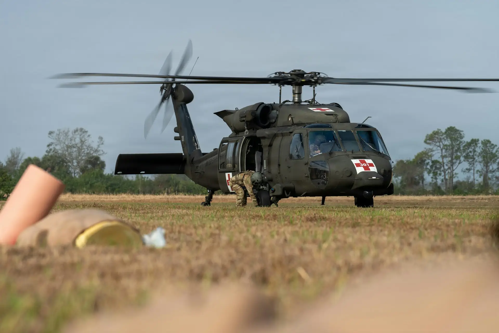 Black Hawk turbine helicopter in a field