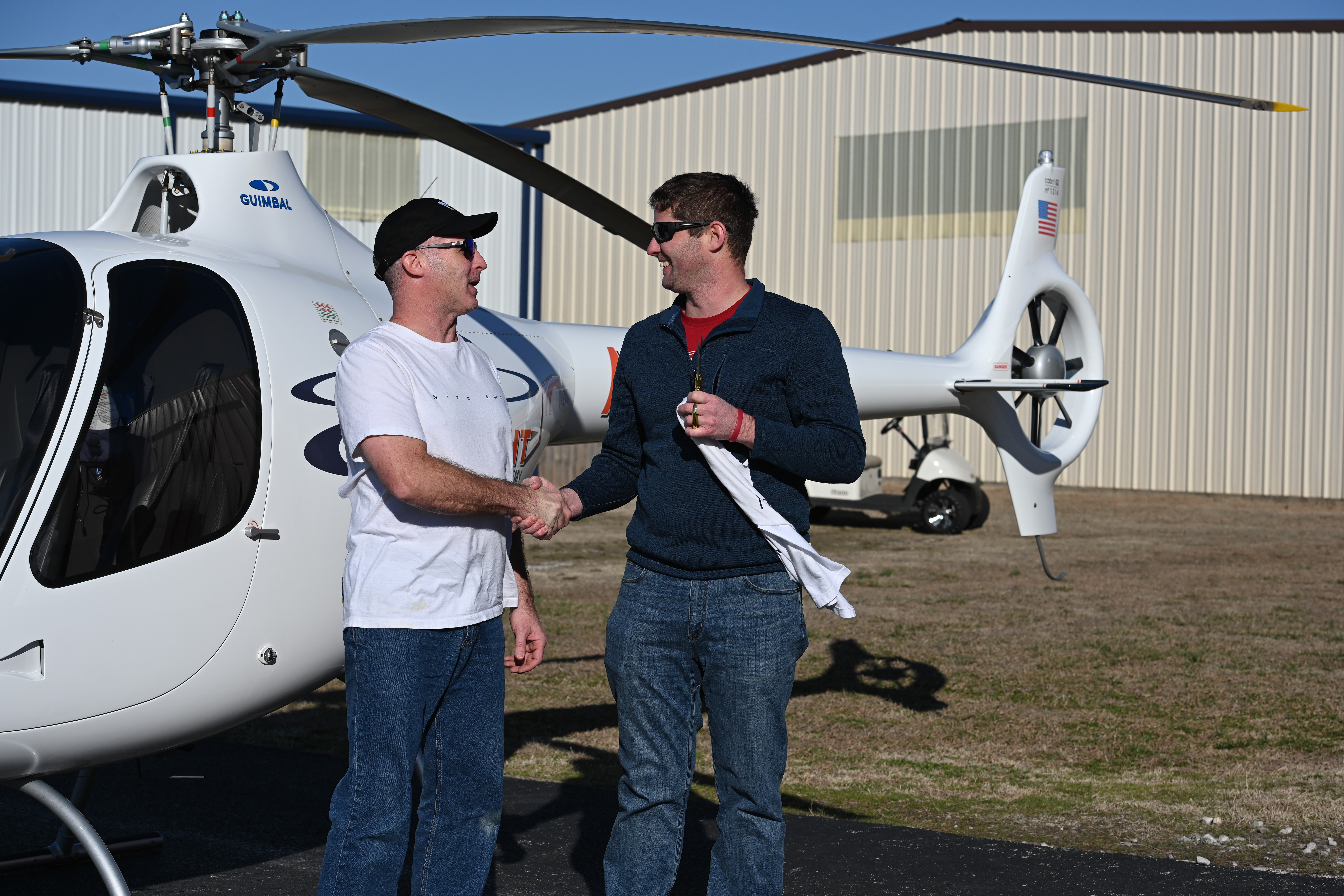 TruFlight Academy student celebrating a helicopter training milestone